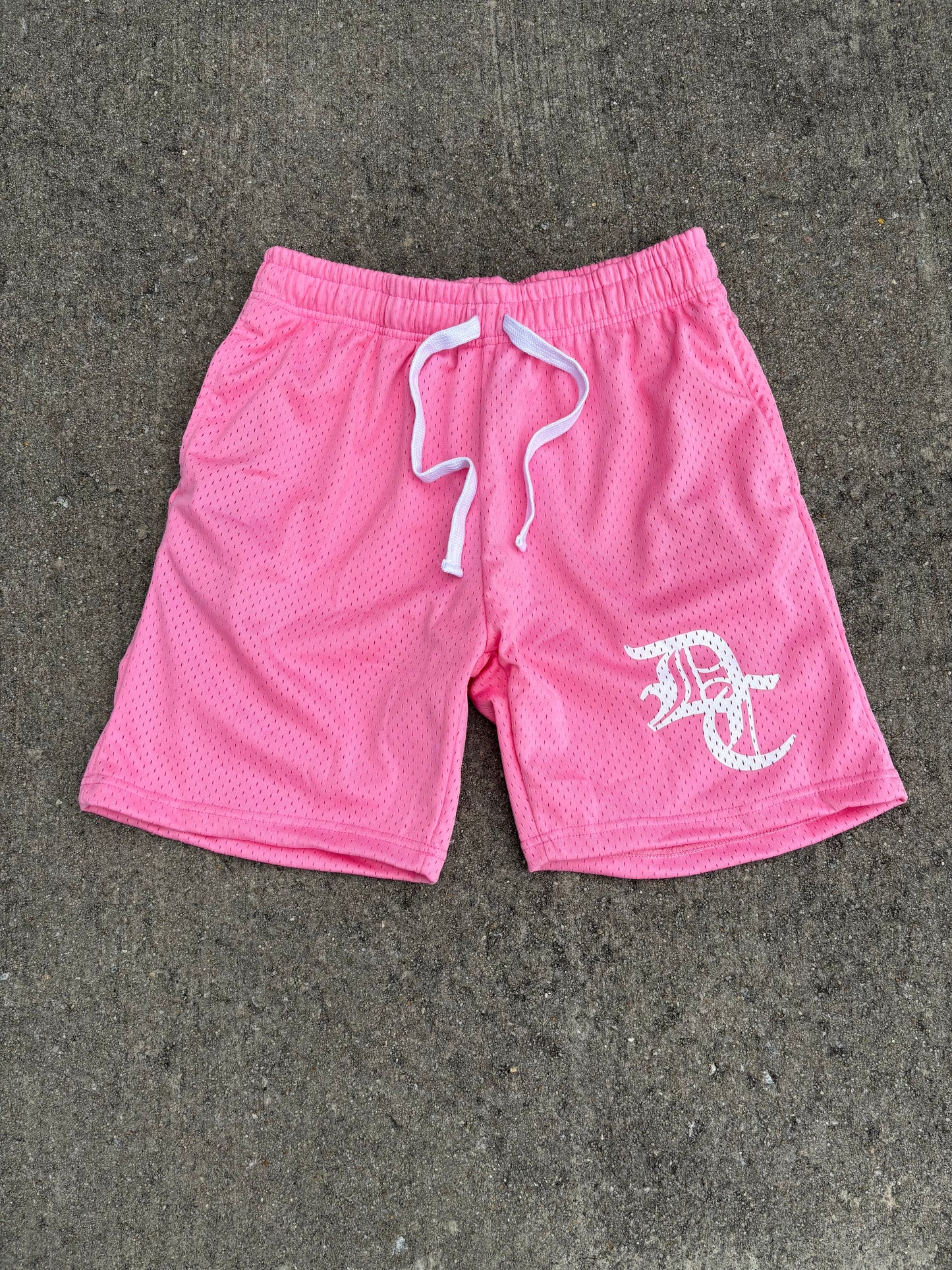 “DEDICATED” PINK MESH SHORTS